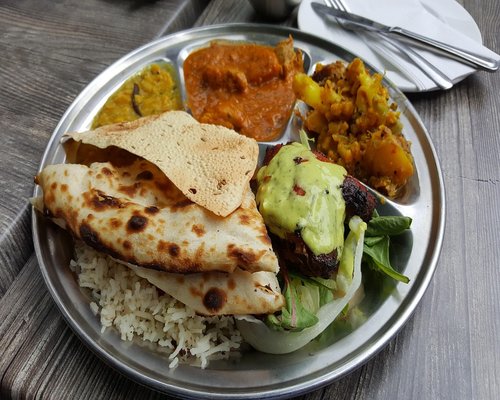 Traditional Indian thali with dal, roti and vegetables